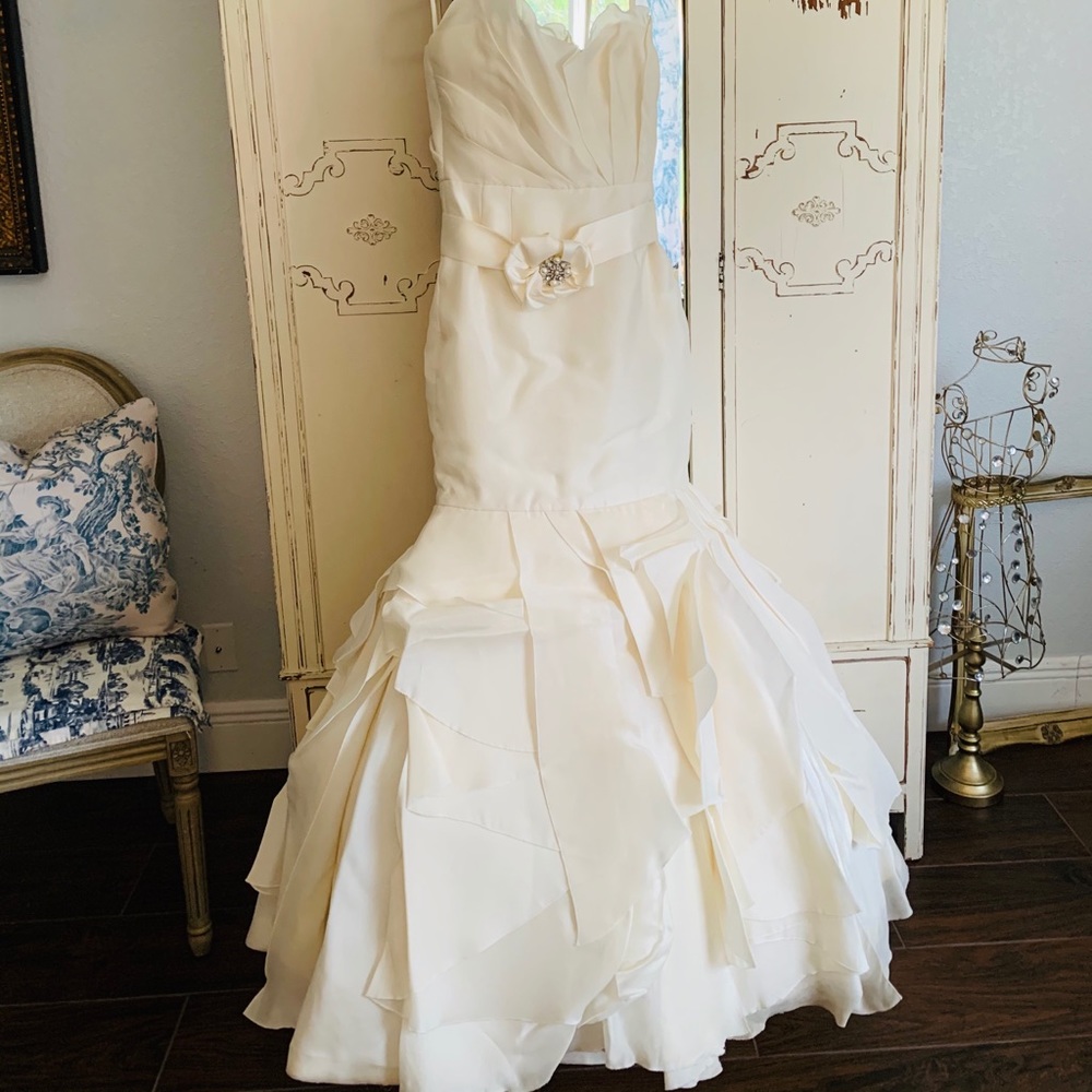 Stunning ivory organza couture gown by Designer RIVINI